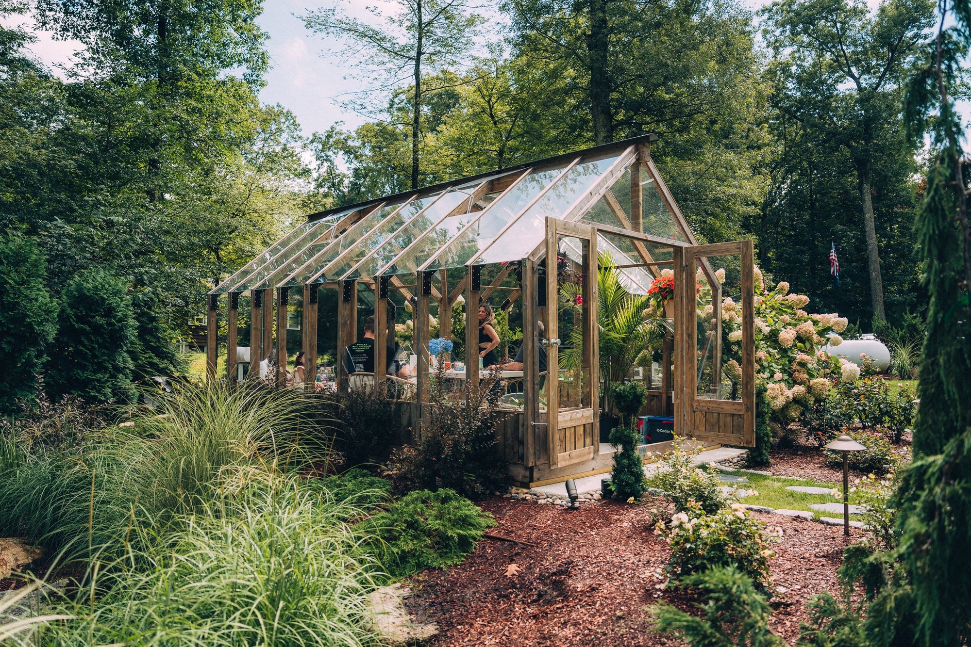 Nordwood greenhouse in a landscaped New York garden