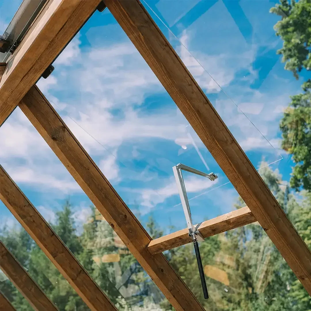The timber roof frame and automatic window opener