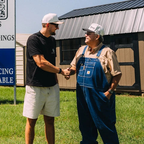 At the Texas dealer lot, in the YourGreenhouses tee